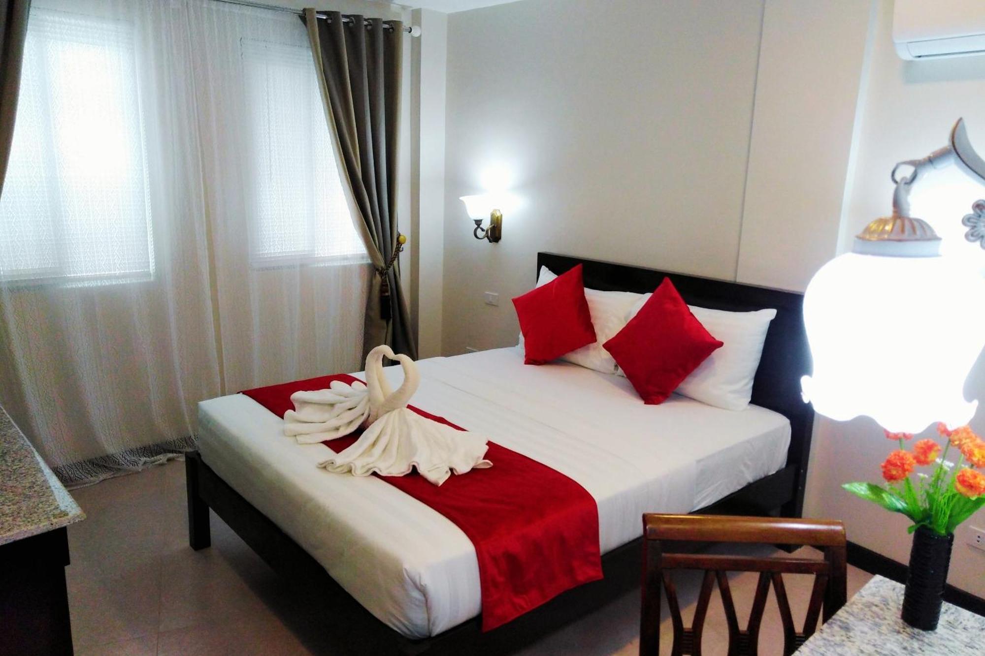 Venezia Suites Hotel Iloilo Стая снимка