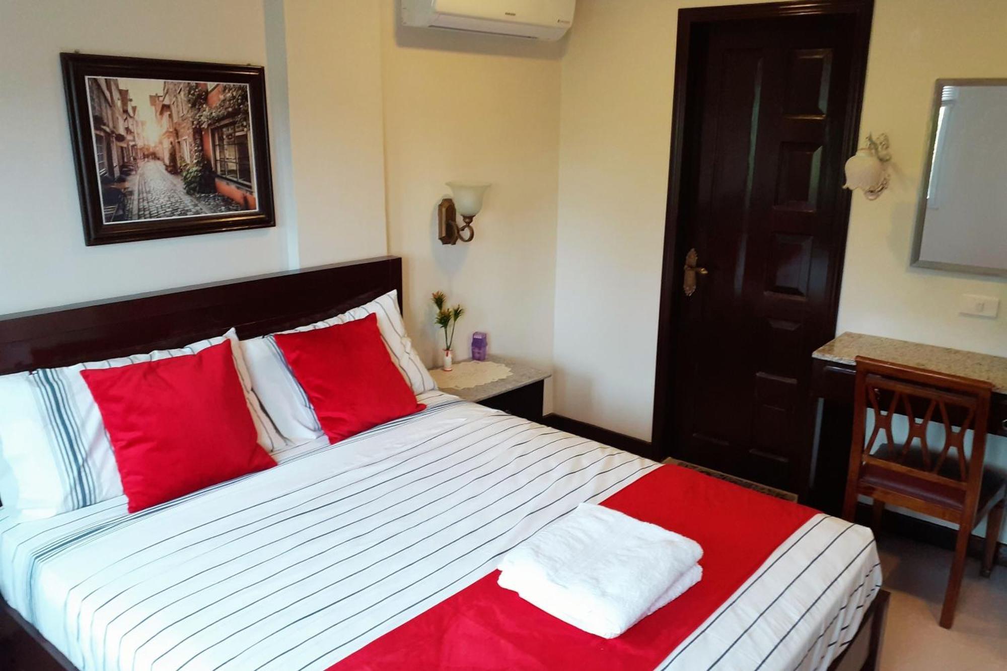 Venezia Suites Hotel Iloilo Стая снимка