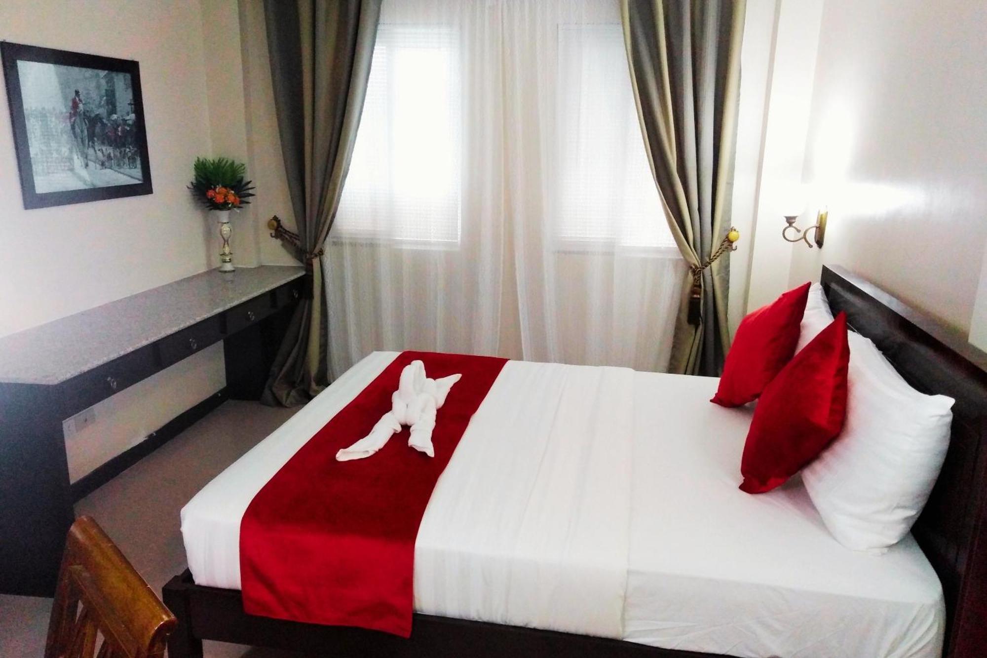 Venezia Suites Hotel Iloilo Стая снимка