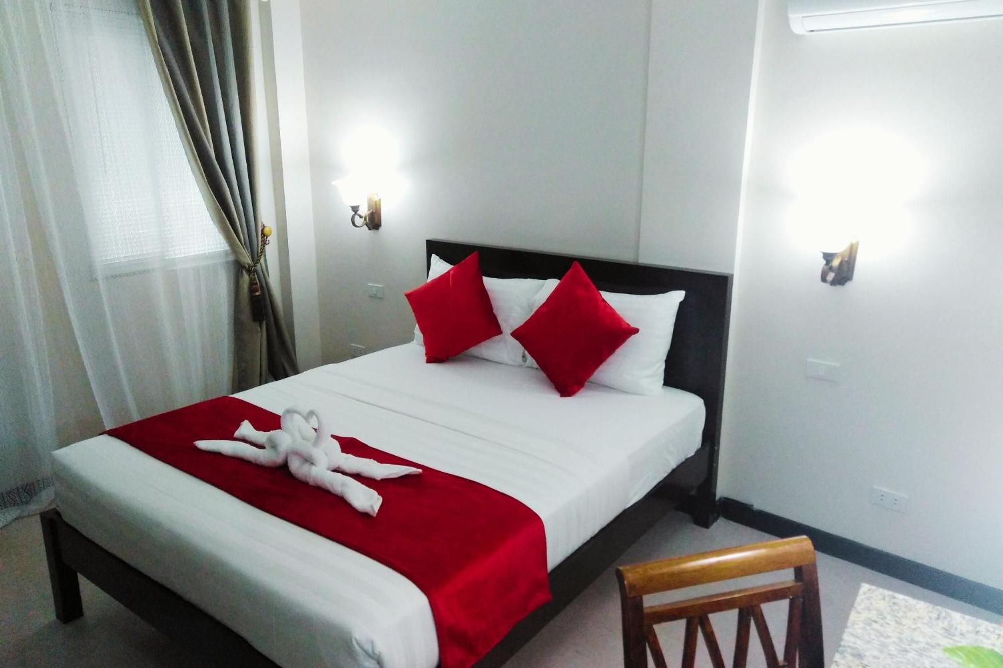 Venezia Suites Hotel Iloilo Стая снимка