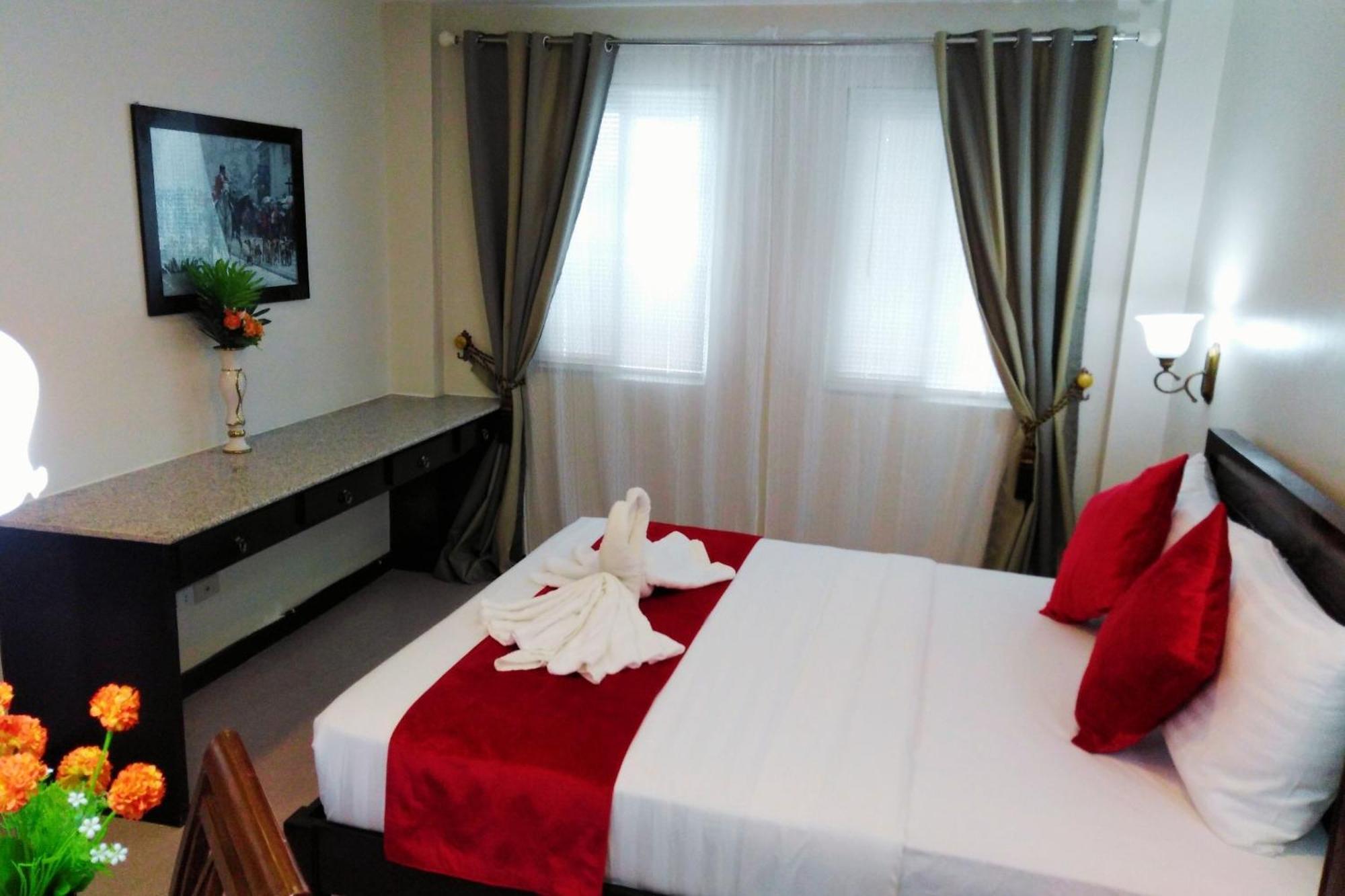 Venezia Suites Hotel Iloilo Стая снимка