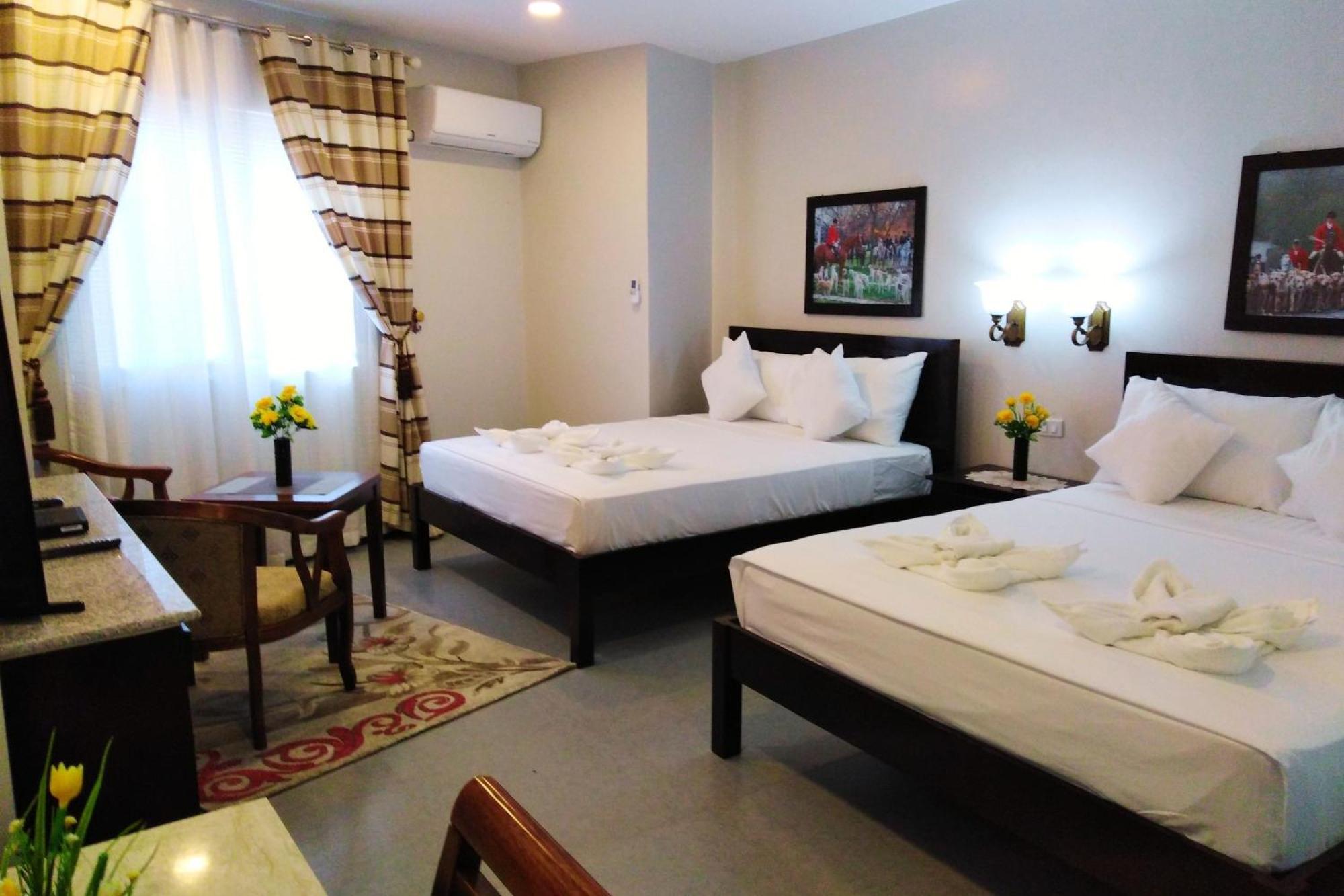 Venezia Suites Hotel Iloilo Стая снимка
